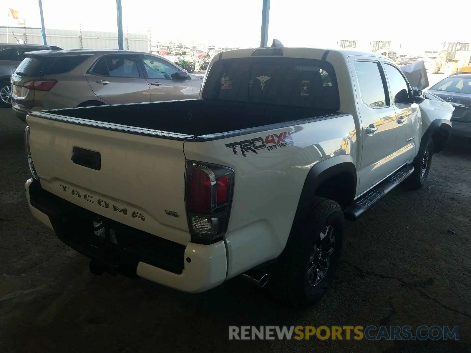 4 Photograph of a damaged car 3TMCZ5AN7LM295416 TOYOTA TACOMA 2020
