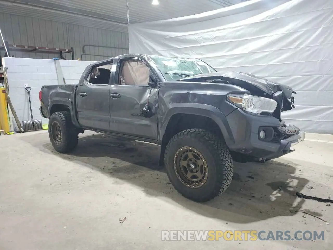 4 Photograph of a damaged car 3TMCZ5AN8LM302535 TOYOTA TACOMA 2020