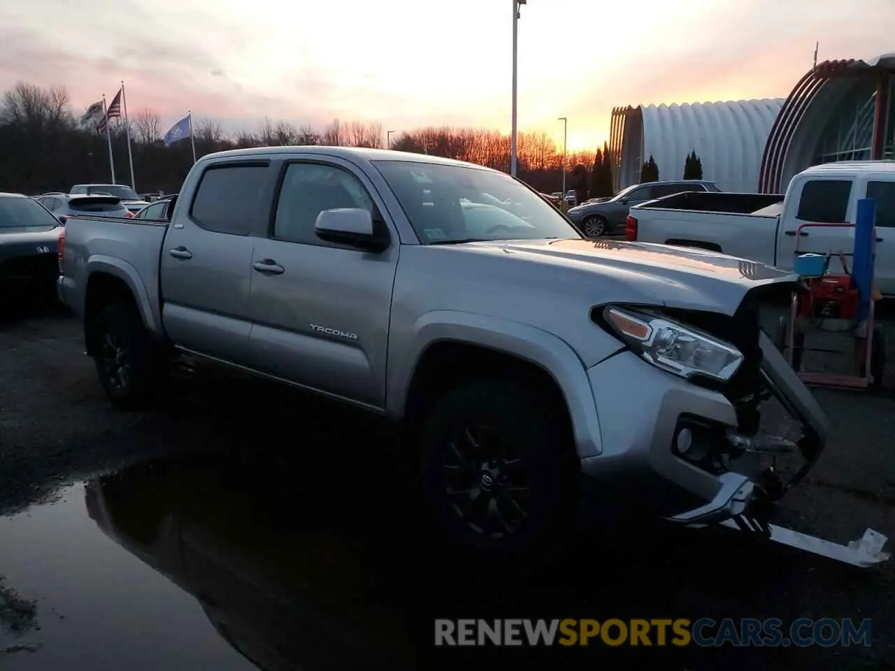 4 Photograph of a damaged car 3TMCZ5AN9LM300437 TOYOTA TACOMA 2020