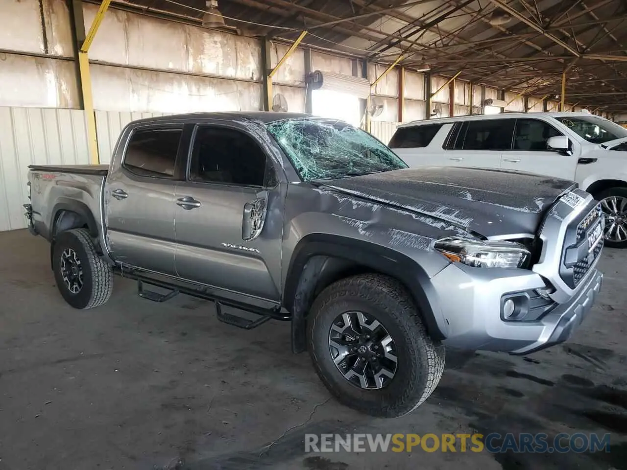 4 Photograph of a damaged car 5TFCZ5AN0LX241515 TOYOTA TACOMA 2020