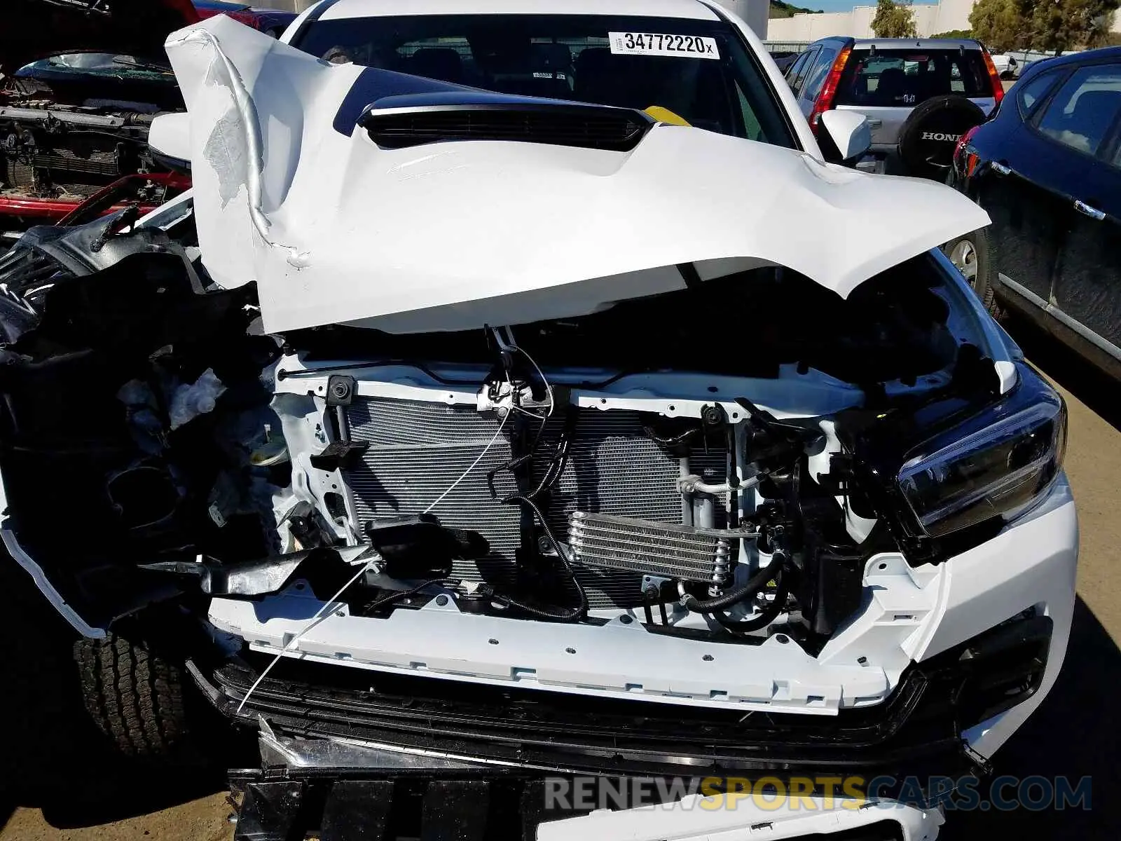 7 Photograph of a damaged car 5TFCZ5AN3LX229780 TOYOTA TACOMA 2020