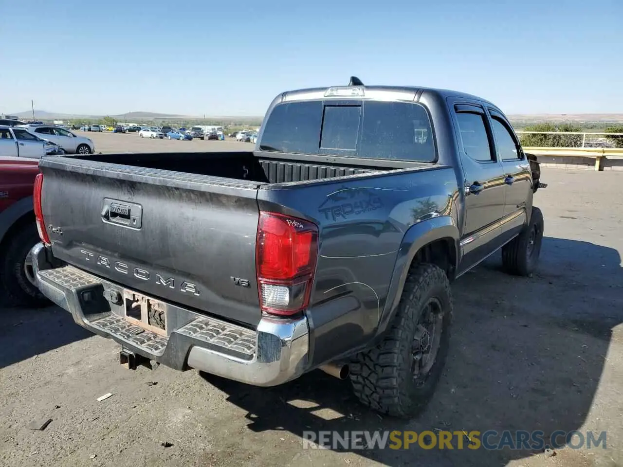 4 Photograph of a damaged car 5TFCZ5AN6LX214707 TOYOTA TACOMA 2020