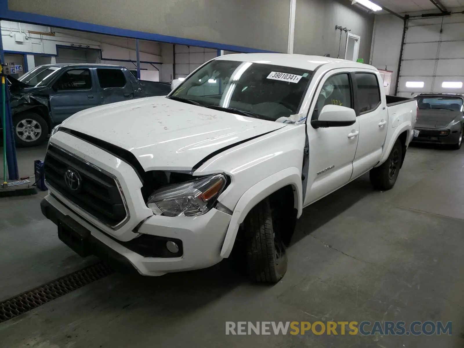 2 Photograph of a damaged car 3TMCZ5AN3MM381694 TOYOTA TACOMA 2021