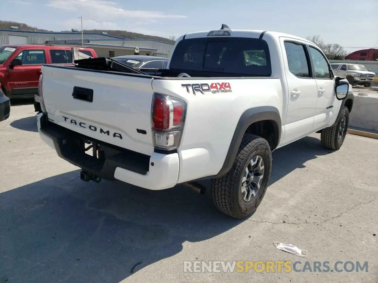 4 Photograph of a damaged car 3TMCZ5AN9MM415489 TOYOTA TACOMA 2021