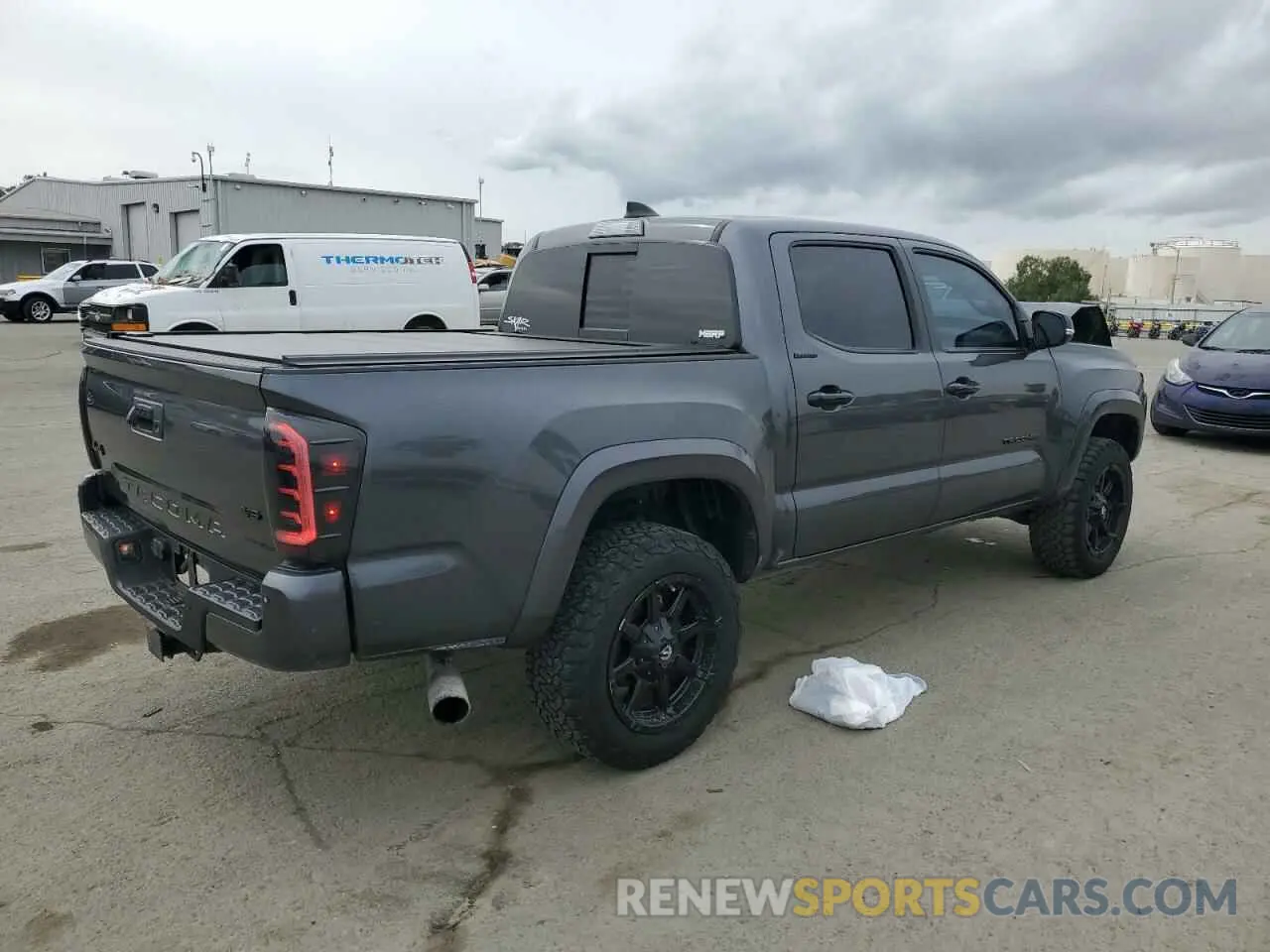 3 Photograph of a damaged car 3TMGZ5AN6MM417704 TOYOTA TACOMA 2021