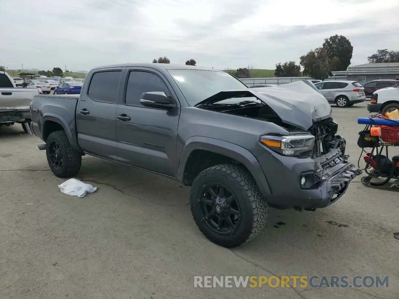 4 Photograph of a damaged car 3TMGZ5AN6MM417704 TOYOTA TACOMA 2021