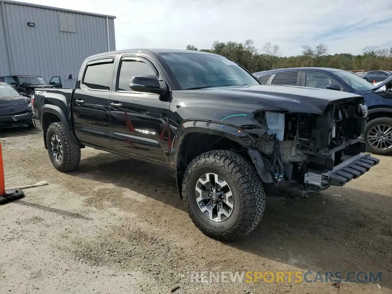 4 Photograph of a damaged car 3TYCZ5AN3MT013424 TOYOTA TACOMA 2021