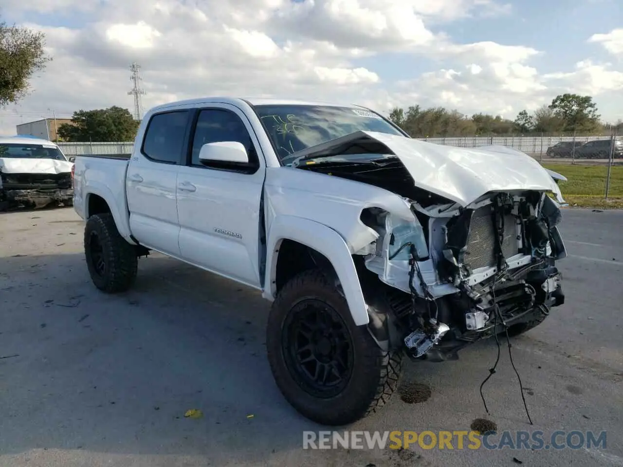 1 Photograph of a damaged car 3TYCZ5AN6MT013997 TOYOTA TACOMA 2021