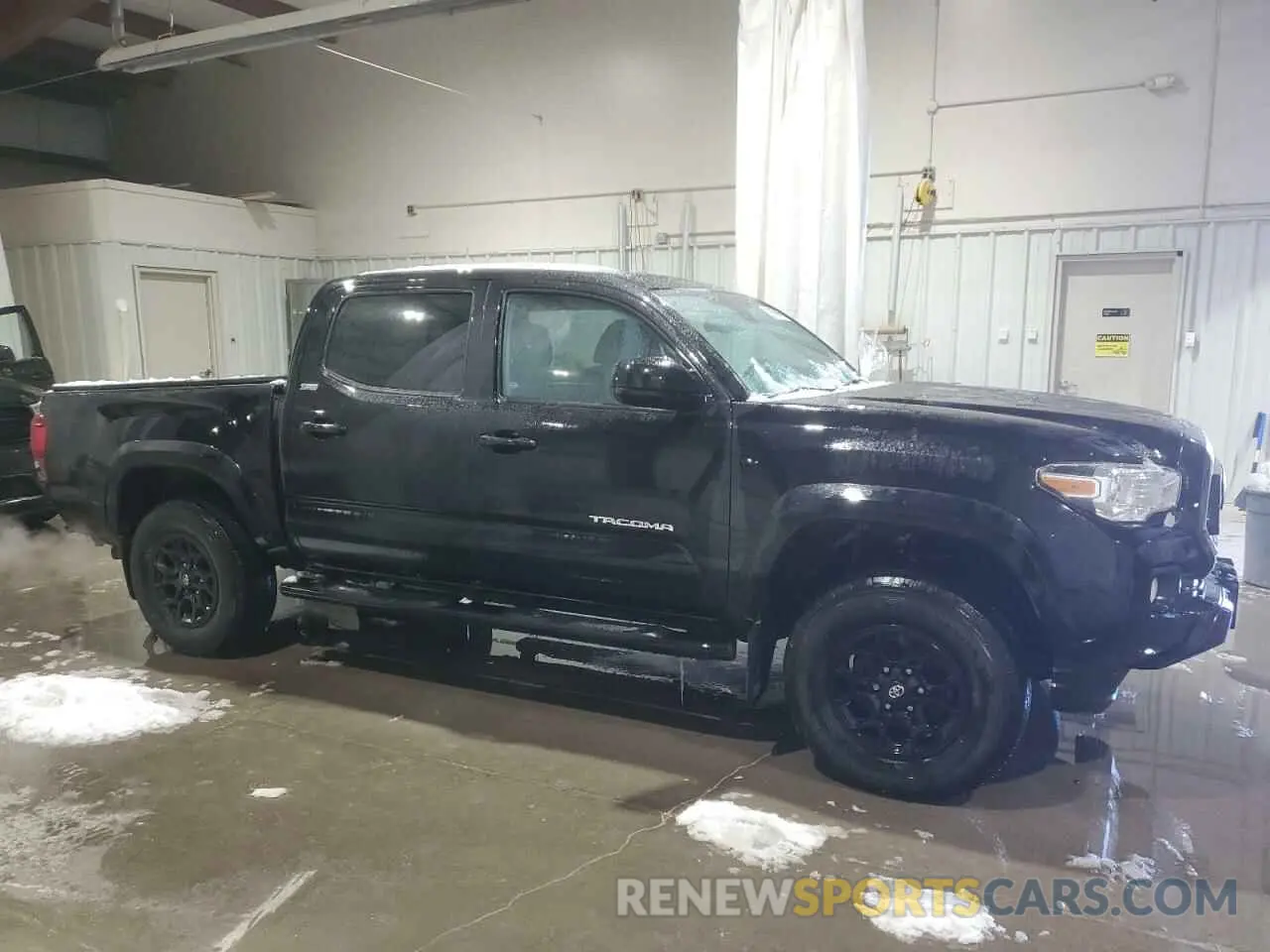 4 Photograph of a damaged car 3TYCZ5AN9MT038487 TOYOTA TACOMA 2021
