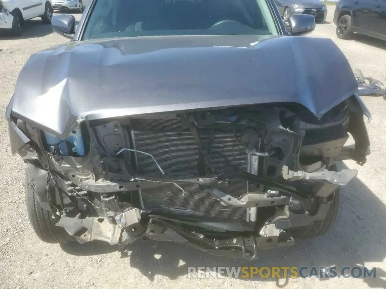 11 Photograph of a damaged car 5TFAX5GN1MX192220 TOYOTA TACOMA 2021