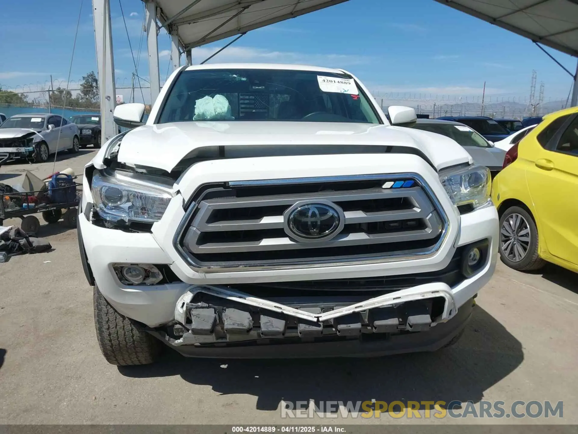 12 Photograph of a damaged car 5TFAZ5CN0MX112308 TOYOTA TACOMA 2021