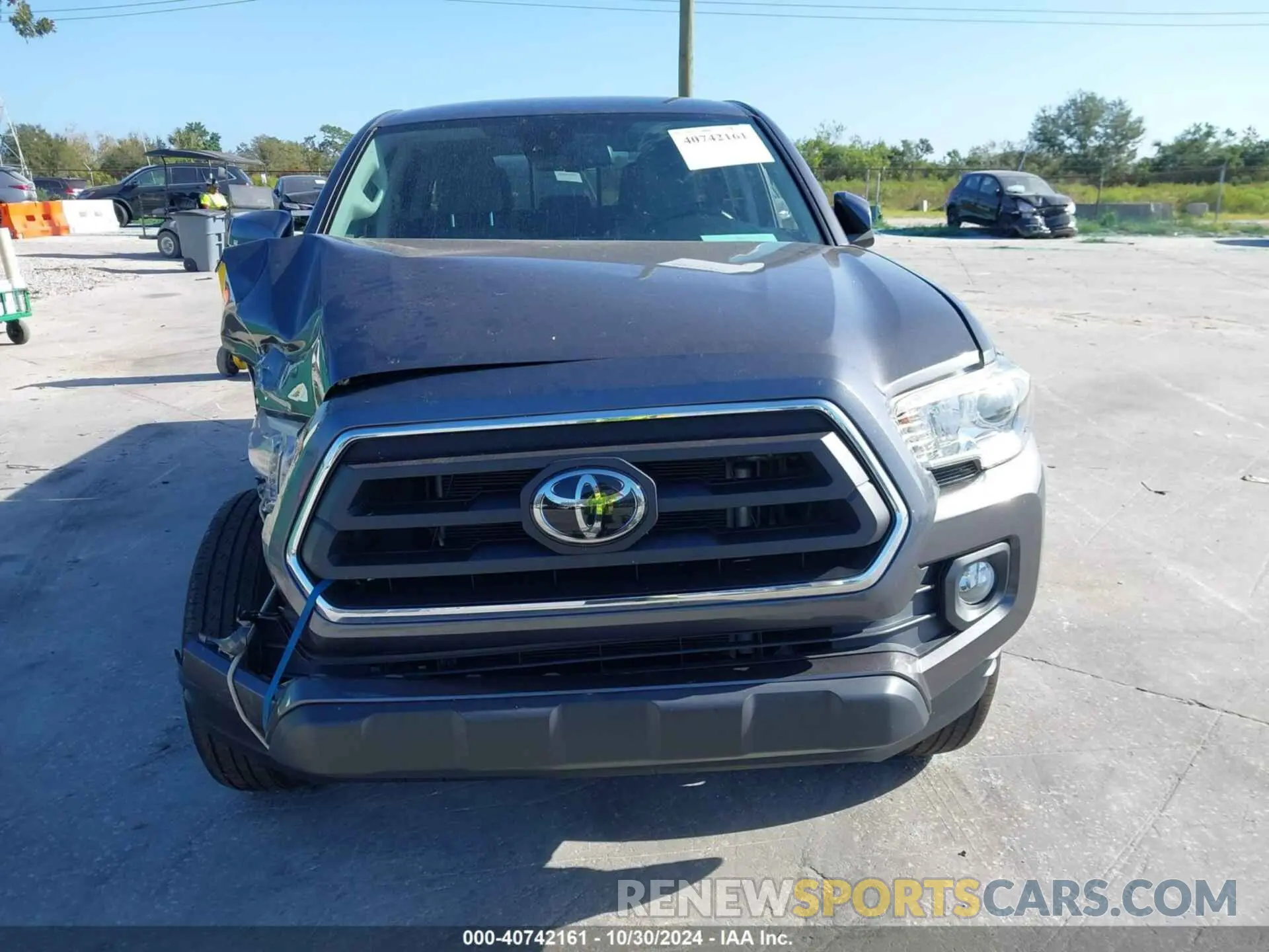 12 Photograph of a damaged car 5TFAZ5CN2MX096824 TOYOTA TACOMA 2021