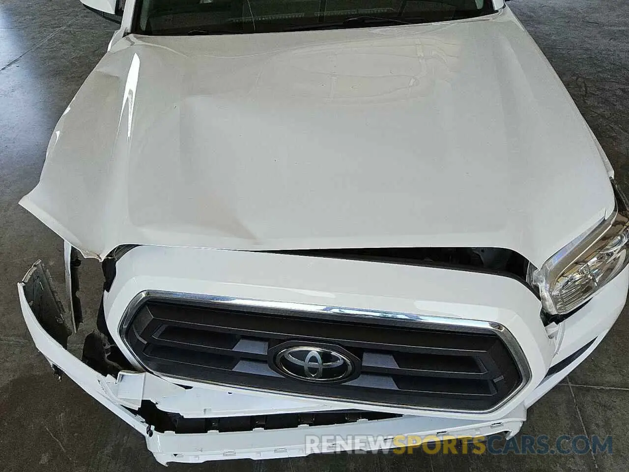 11 Photograph of a damaged car 5TFAZ5CN3MX117938 TOYOTA TACOMA 2021