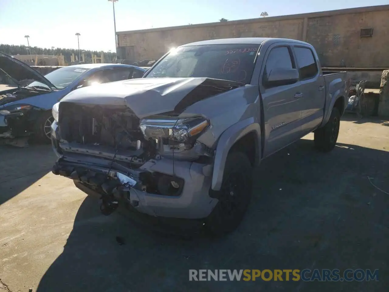 2 Photograph of a damaged car 5TFAZ5CN4MX103580 TOYOTA TACOMA 2021