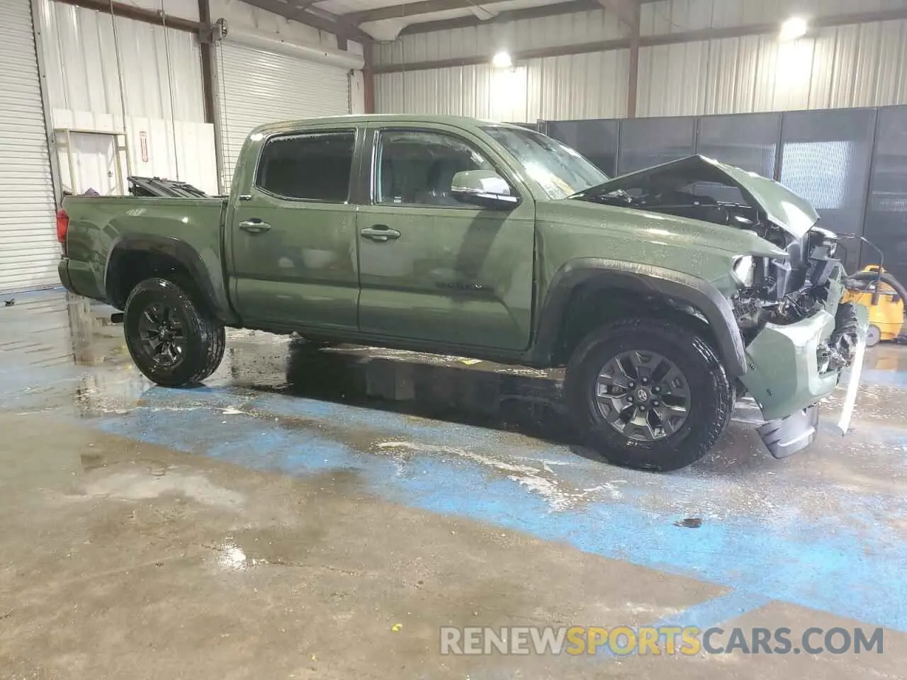 4 Photograph of a damaged car 5TFAZ5CN5MX096302 TOYOTA TACOMA 2021