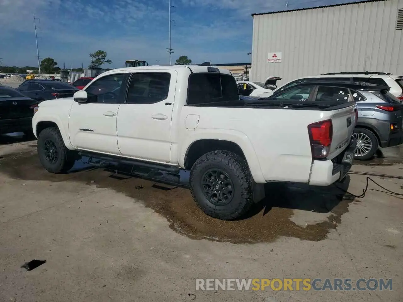 2 Photograph of a damaged car 5TFAZ5CN5MX104835 TOYOTA TACOMA 2021