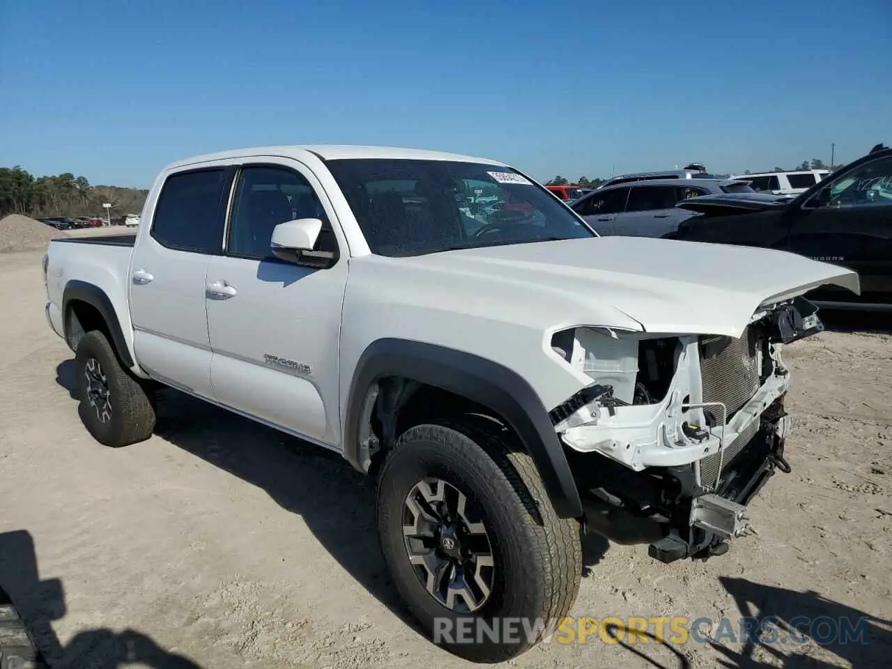 4 Photograph of a damaged car 5TFAZ5CN6MX109932 TOYOTA TACOMA 2021