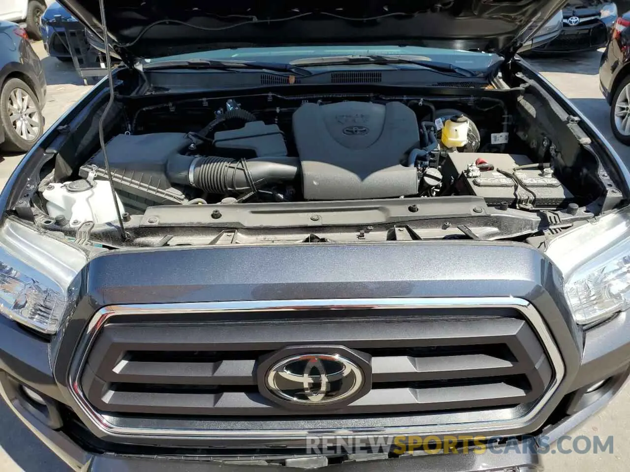 7 Photograph of a damaged car 5TFAZ5CN7MX097435 TOYOTA TACOMA 2021