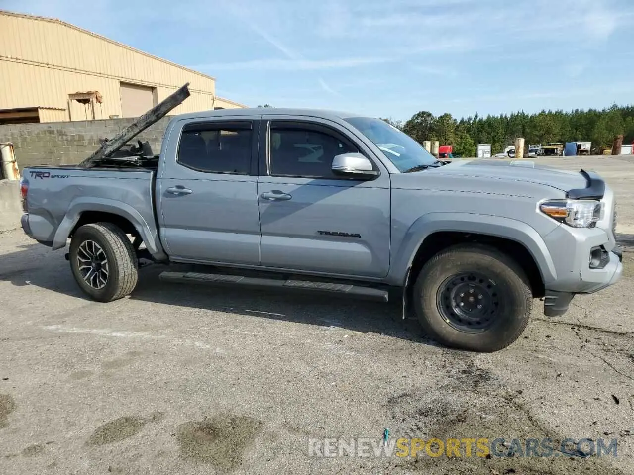 4 Photograph of a damaged car 5TFAZ5CN8MX111794 TOYOTA TACOMA 2021