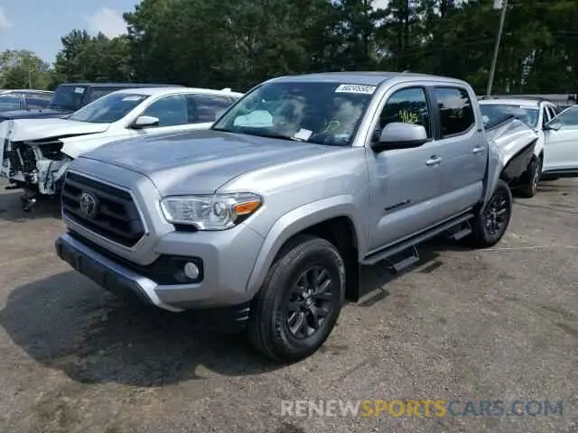 2 Photograph of a damaged car 5TFAZ5CN8MX114419 TOYOTA TACOMA 2021