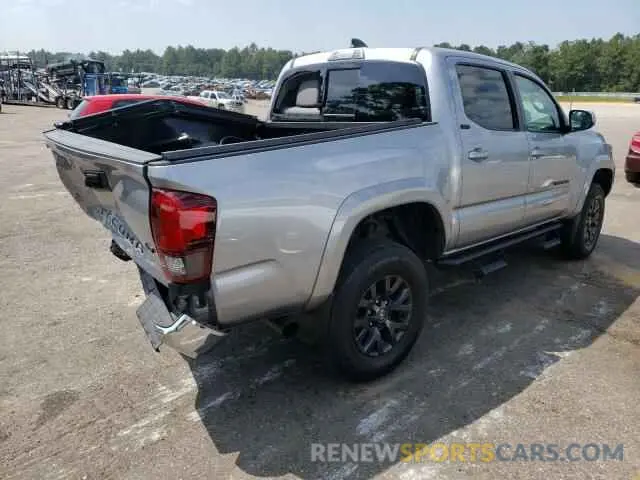 4 Photograph of a damaged car 5TFAZ5CN8MX114419 TOYOTA TACOMA 2021