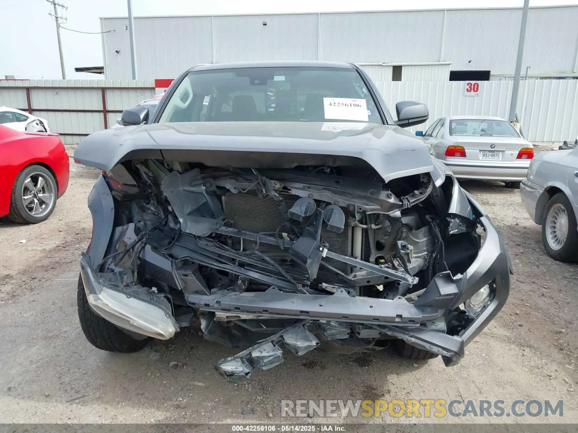 12 Photograph of a damaged car 5TFAZ5CN9MX105504 TOYOTA TACOMA 2021