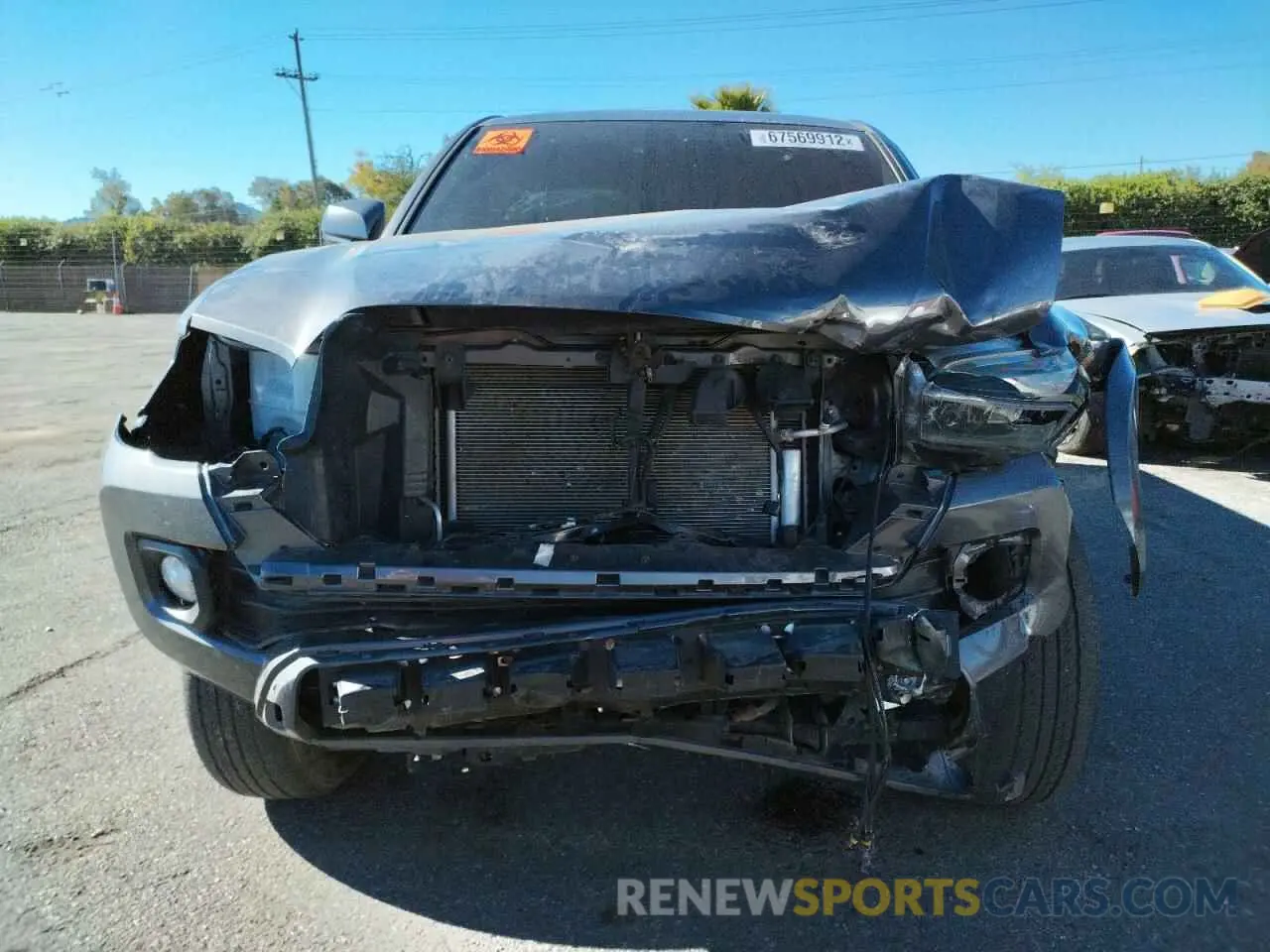 5 Photograph of a damaged car 5TFAZ5CN9MX111187 TOYOTA TACOMA 2021