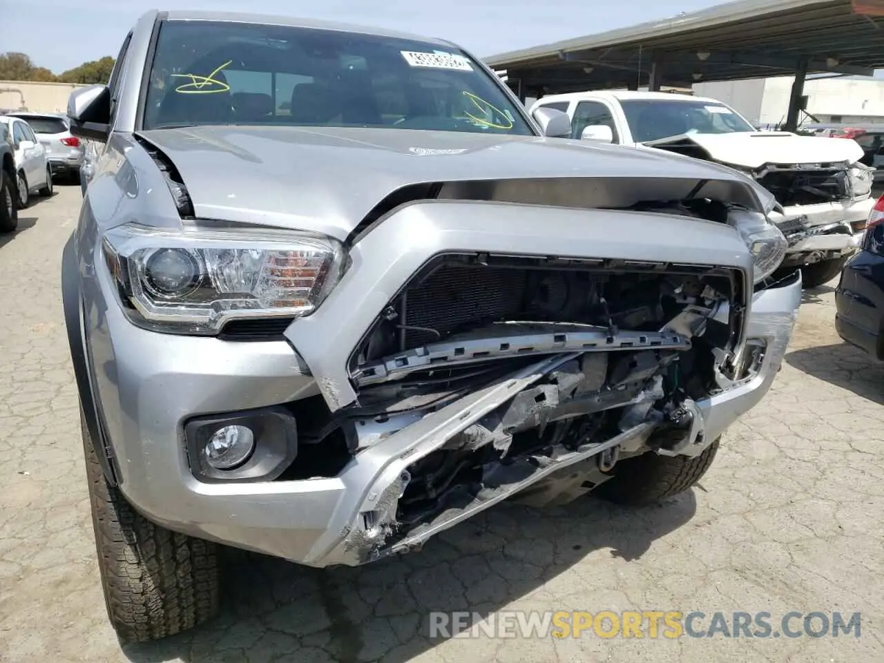 9 Photograph of a damaged car 5TFCZ5AN3MX268306 TOYOTA TACOMA 2021