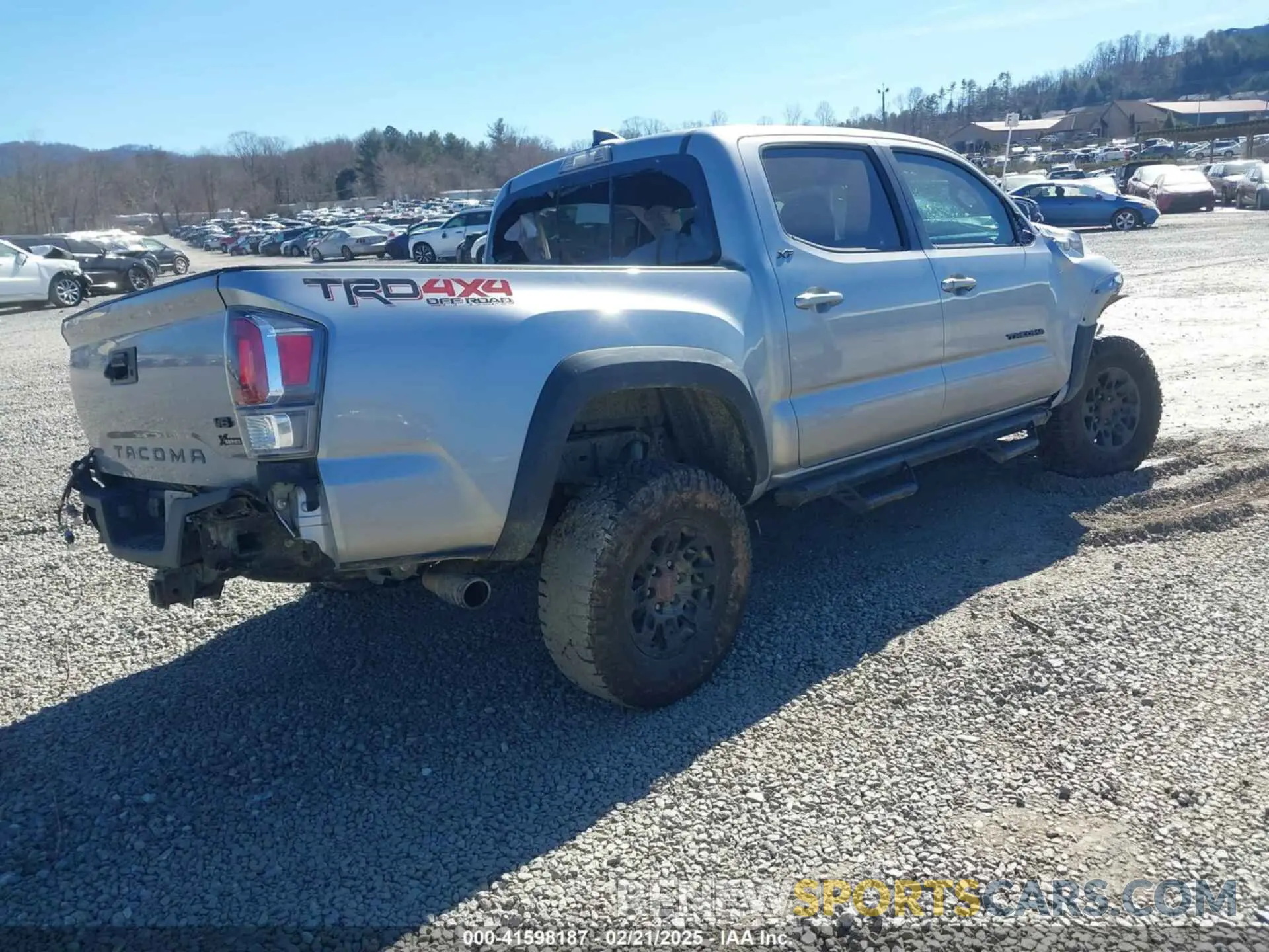 4 Photograph of a damaged car 5TFCZ5AN4MX274017 TOYOTA TACOMA 2021