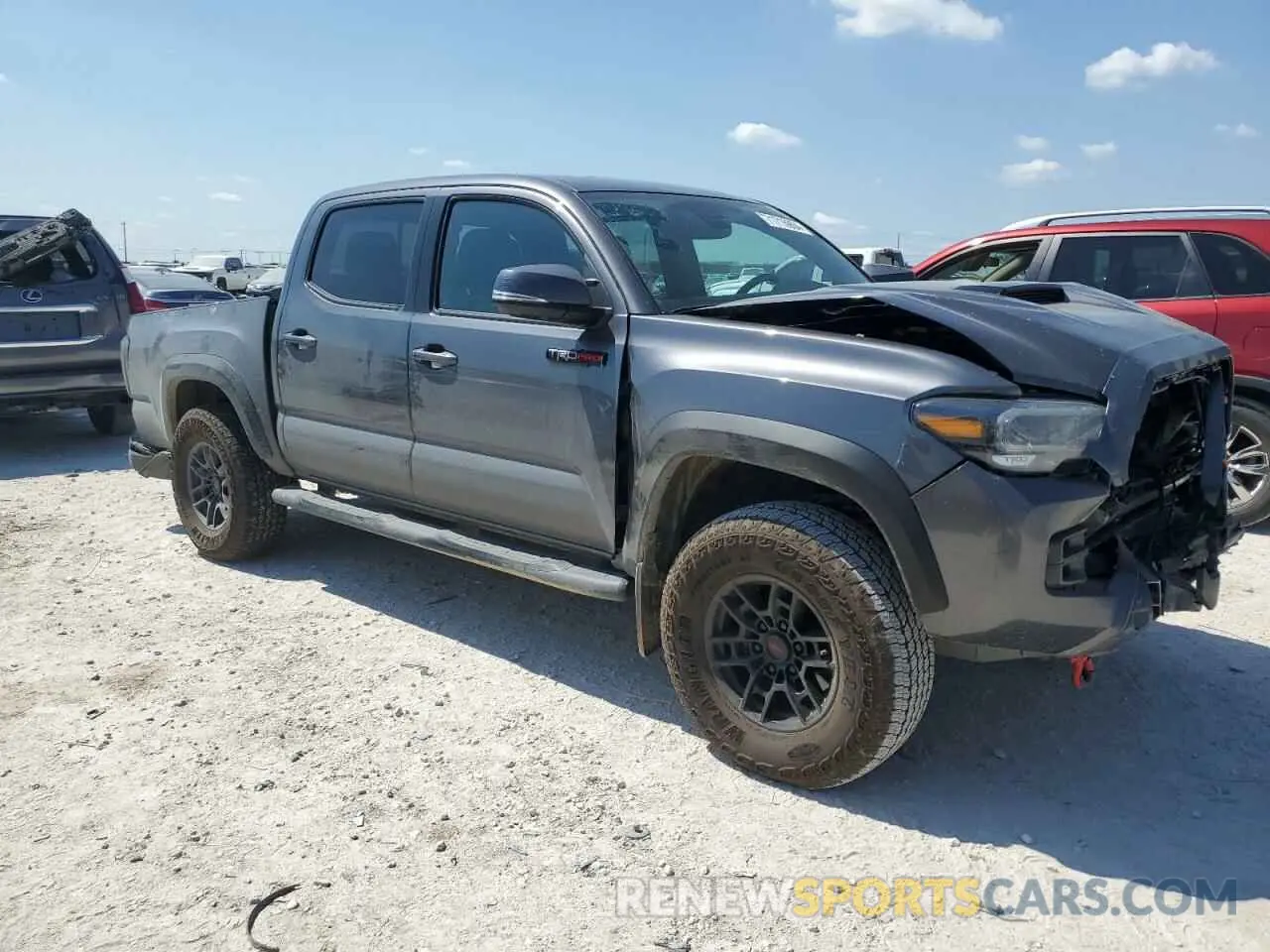 4 Photograph of a damaged car 5TFCZ5AN4MX275748 TOYOTA TACOMA 2021