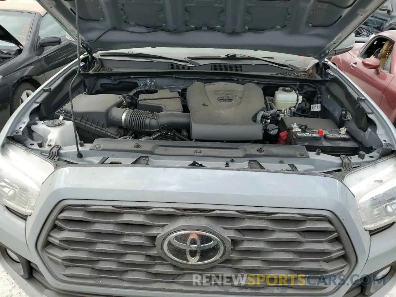 7 Photograph of a damaged car 5TFCZ5AN6MX255923 TOYOTA TACOMA 2021