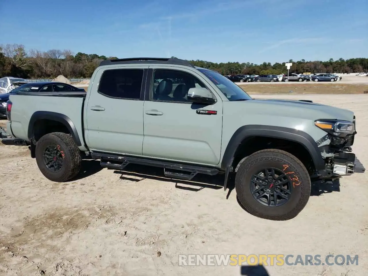 4 Photograph of a damaged car 5TFCZ5AN6MX266064 TOYOTA TACOMA 2021