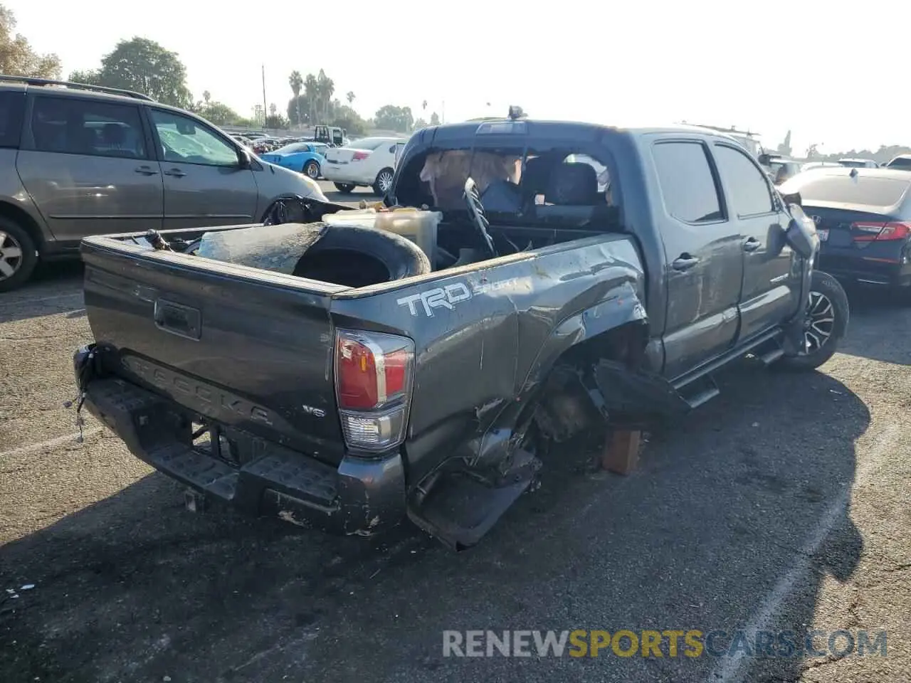 4 Photograph of a damaged car 3TMAZ5CN6NM183259 TOYOTA TACOMA 2022