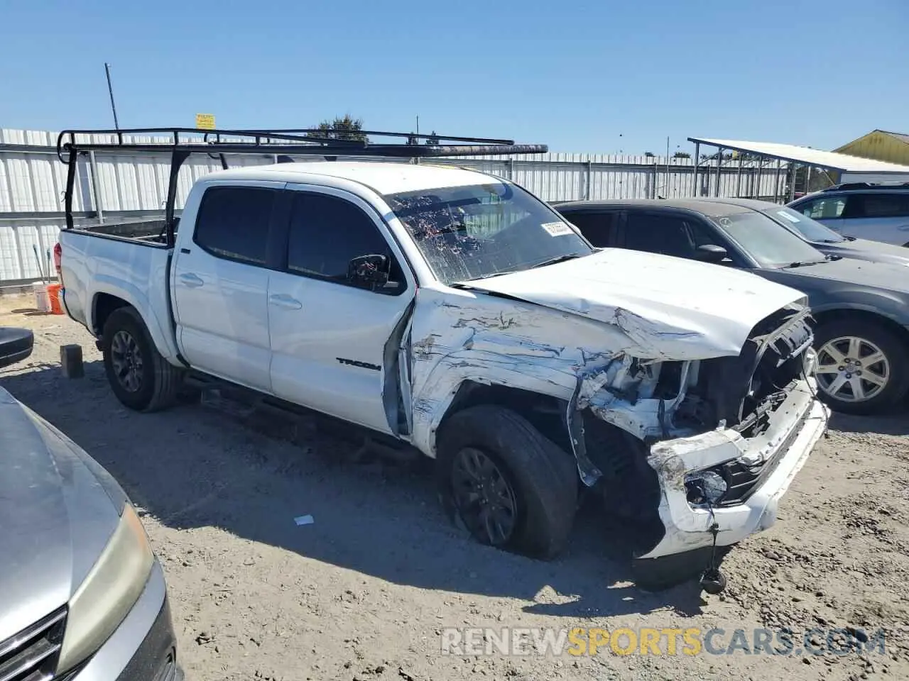 4 Photograph of a damaged car 3TMAZ5CN9NM195874 TOYOTA TACOMA 2022