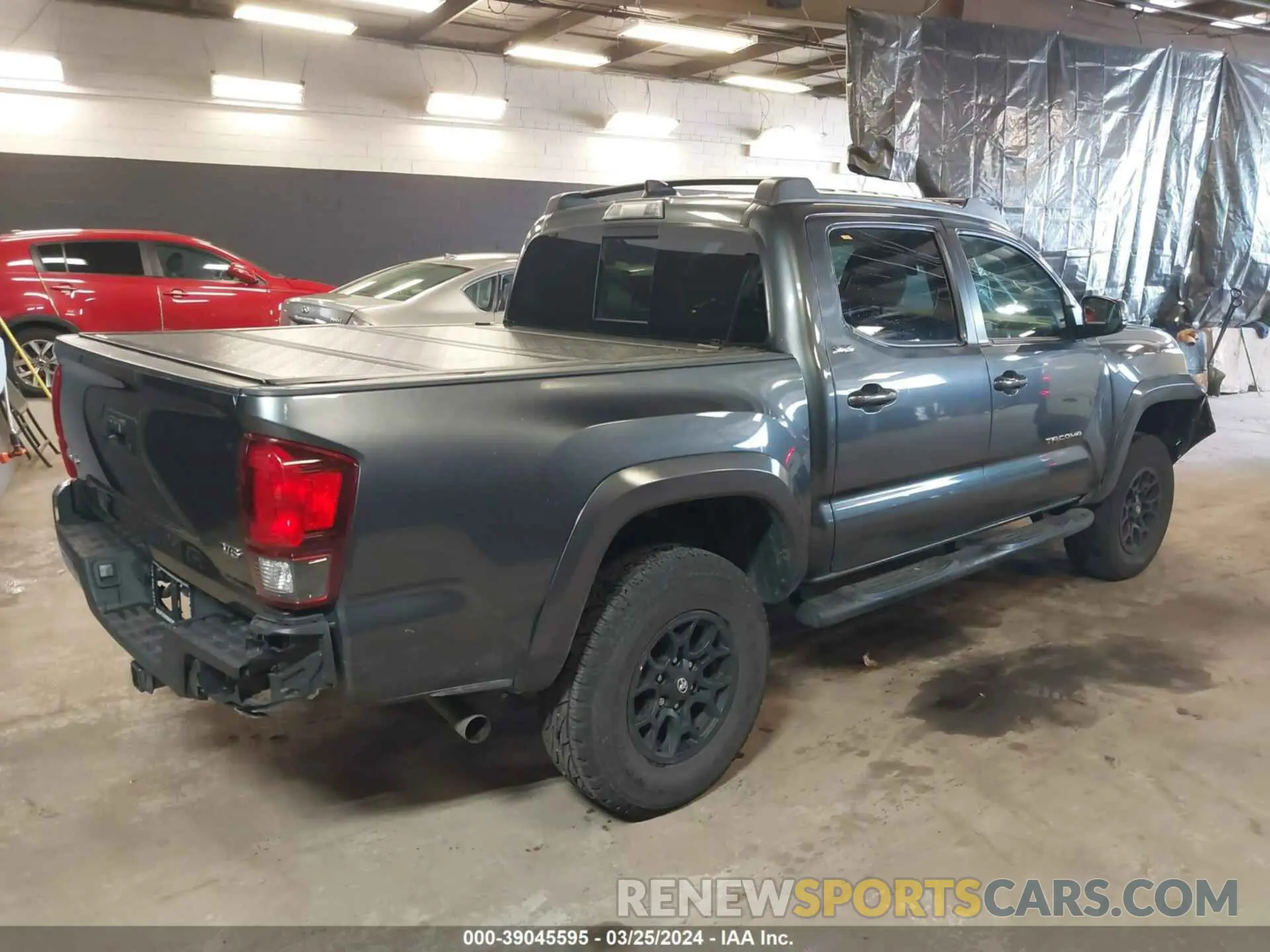 4 Photograph of a damaged car 3TMCZ5AN3NM501933 TOYOTA TACOMA 2022