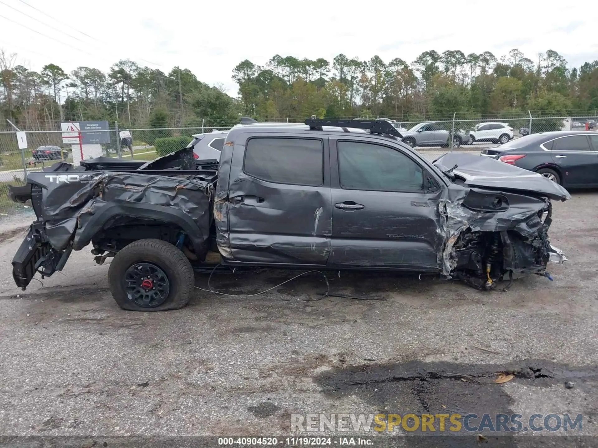14 Photograph of a damaged car 3TMCZ5AN9NM464726 TOYOTA TACOMA 2022