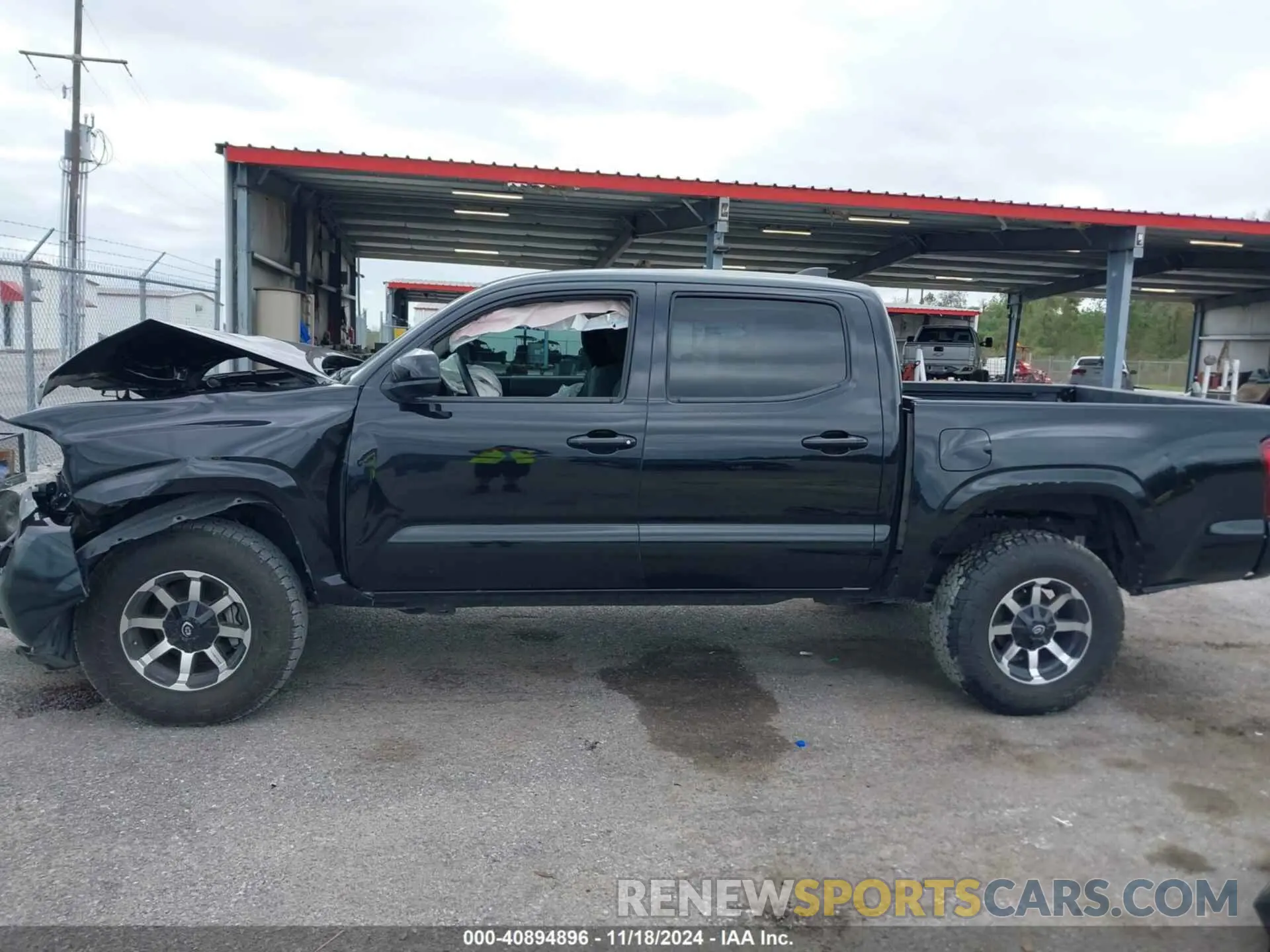 14 Photograph of a damaged car 3TYCZ5AN8NT095118 TOYOTA TACOMA 2022