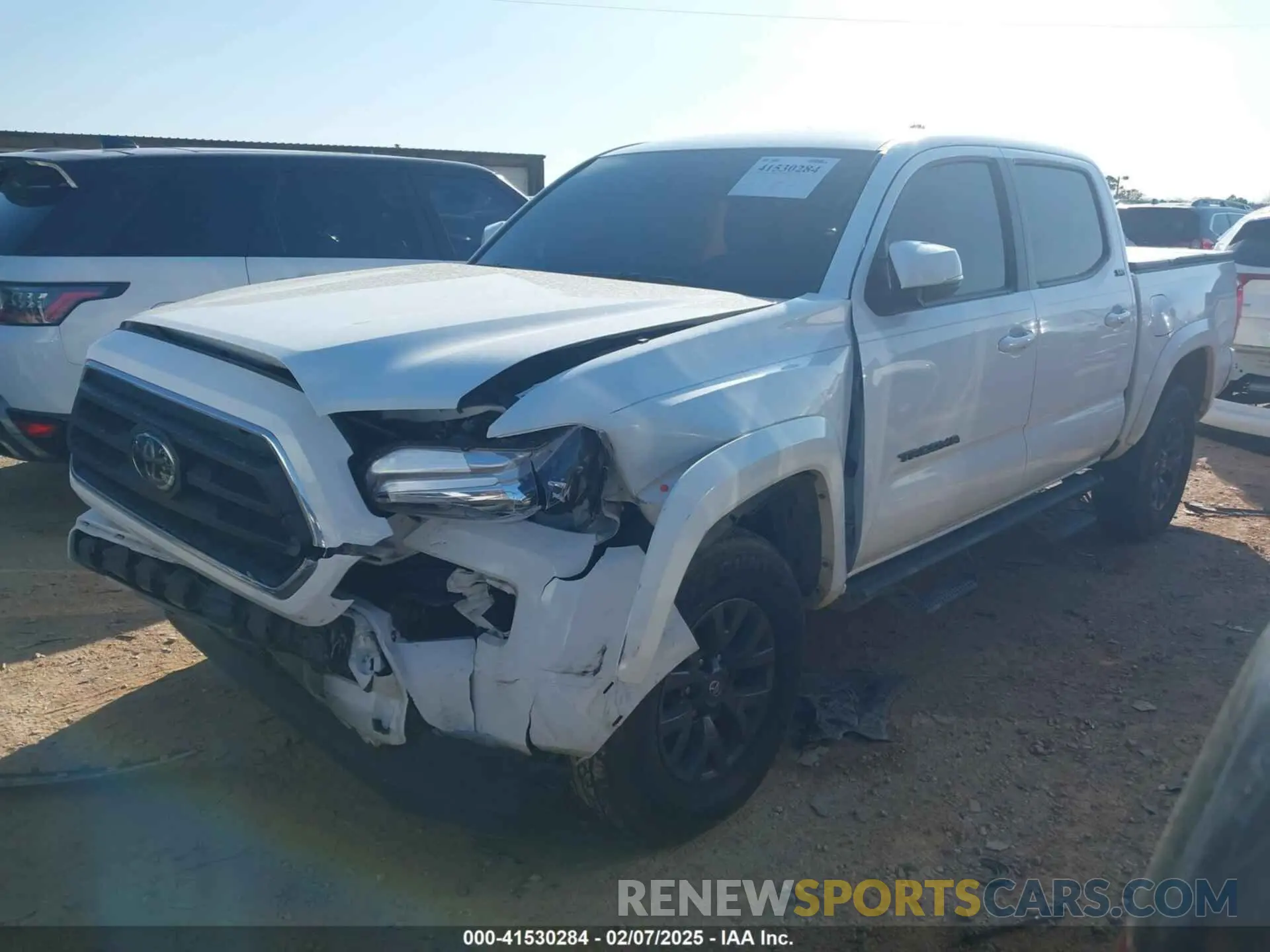 2 Photograph of a damaged car 3TMAZ5CN0PM214752 TOYOTA TACOMA 2023