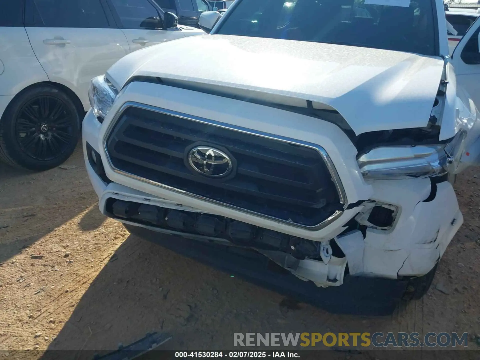 6 Photograph of a damaged car 3TMAZ5CN0PM214752 TOYOTA TACOMA 2023