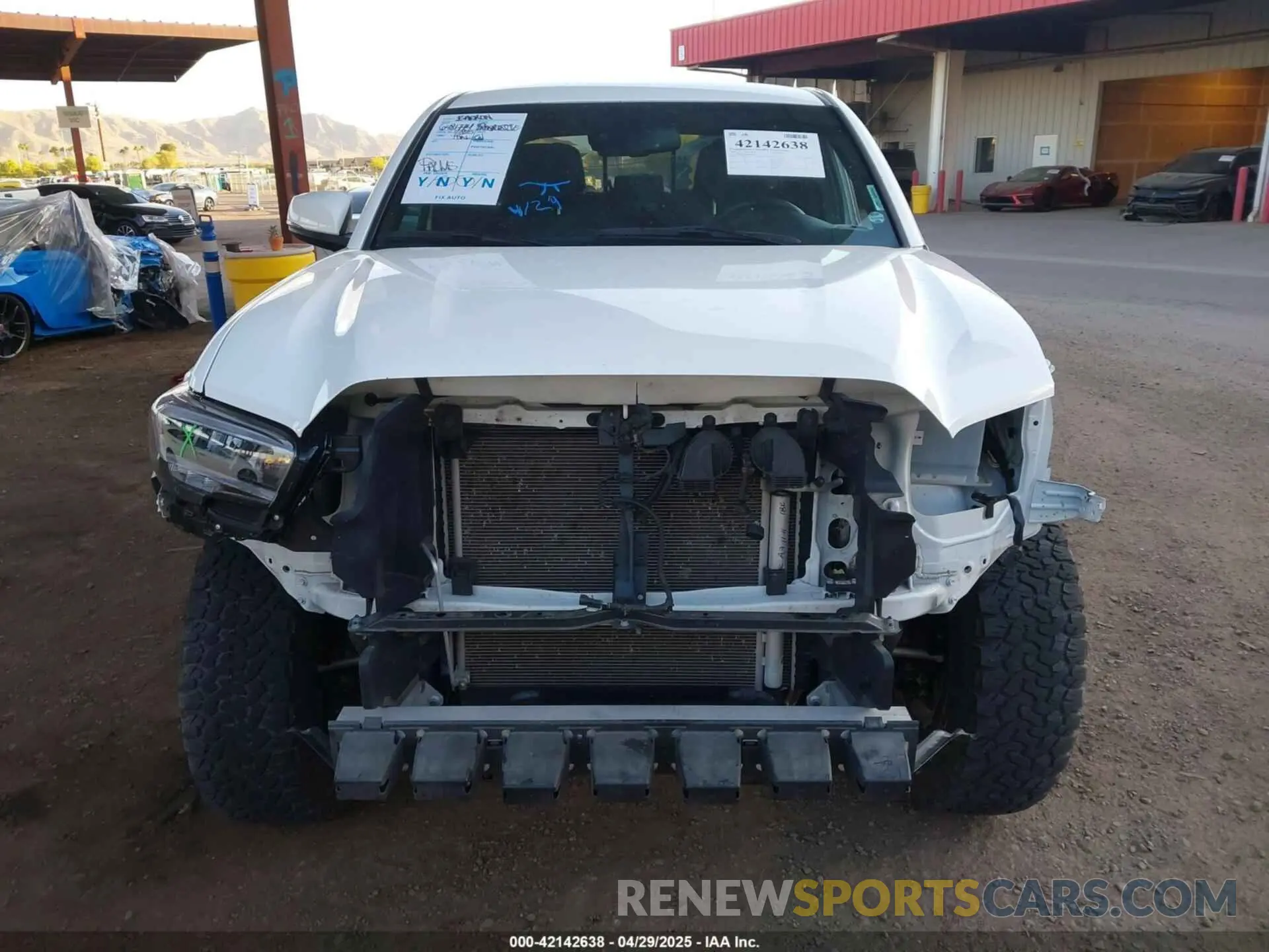 12 Photograph of a damaged car 3TMAZ5CN2PM201937 TOYOTA TACOMA 2023