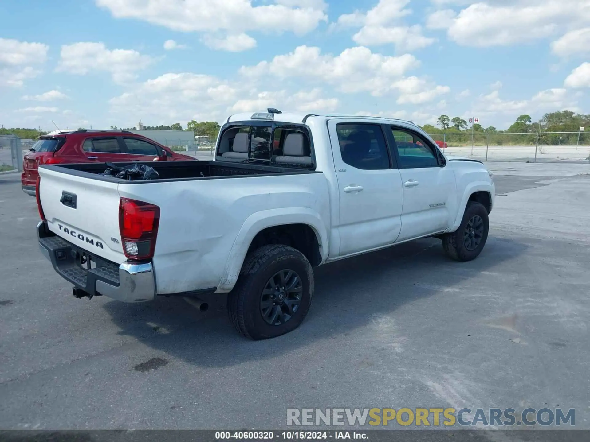 4 Photograph of a damaged car 3TMAZ5CN2PM218625 TOYOTA TACOMA 2023