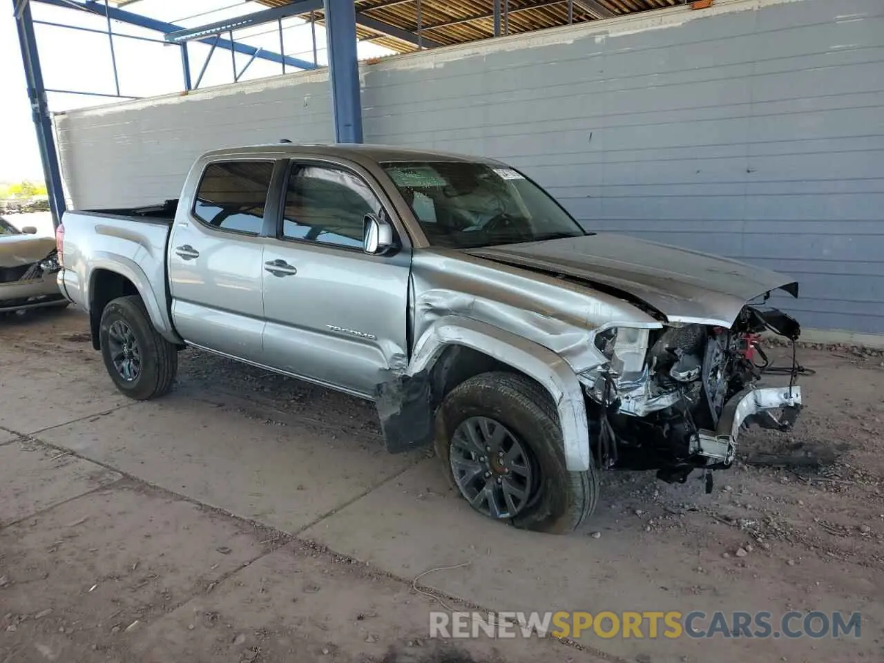 4 Photograph of a damaged car 3TMAZ5CN3PM207987 TOYOTA TACOMA 2023