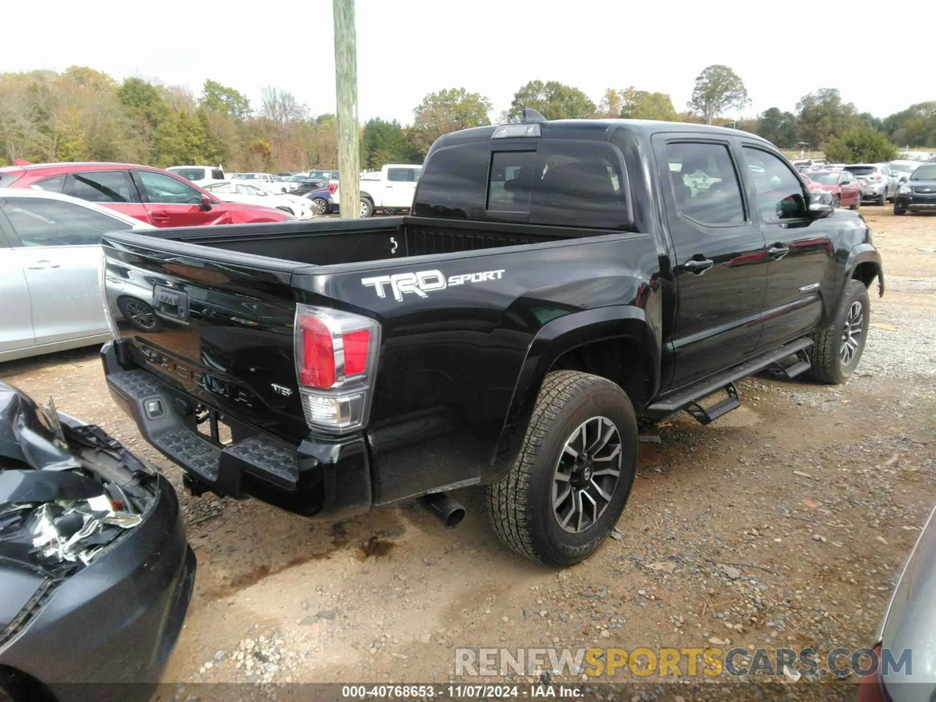4 Photograph of a damaged car 3TMAZ5CN5PM215847 TOYOTA TACOMA 2023