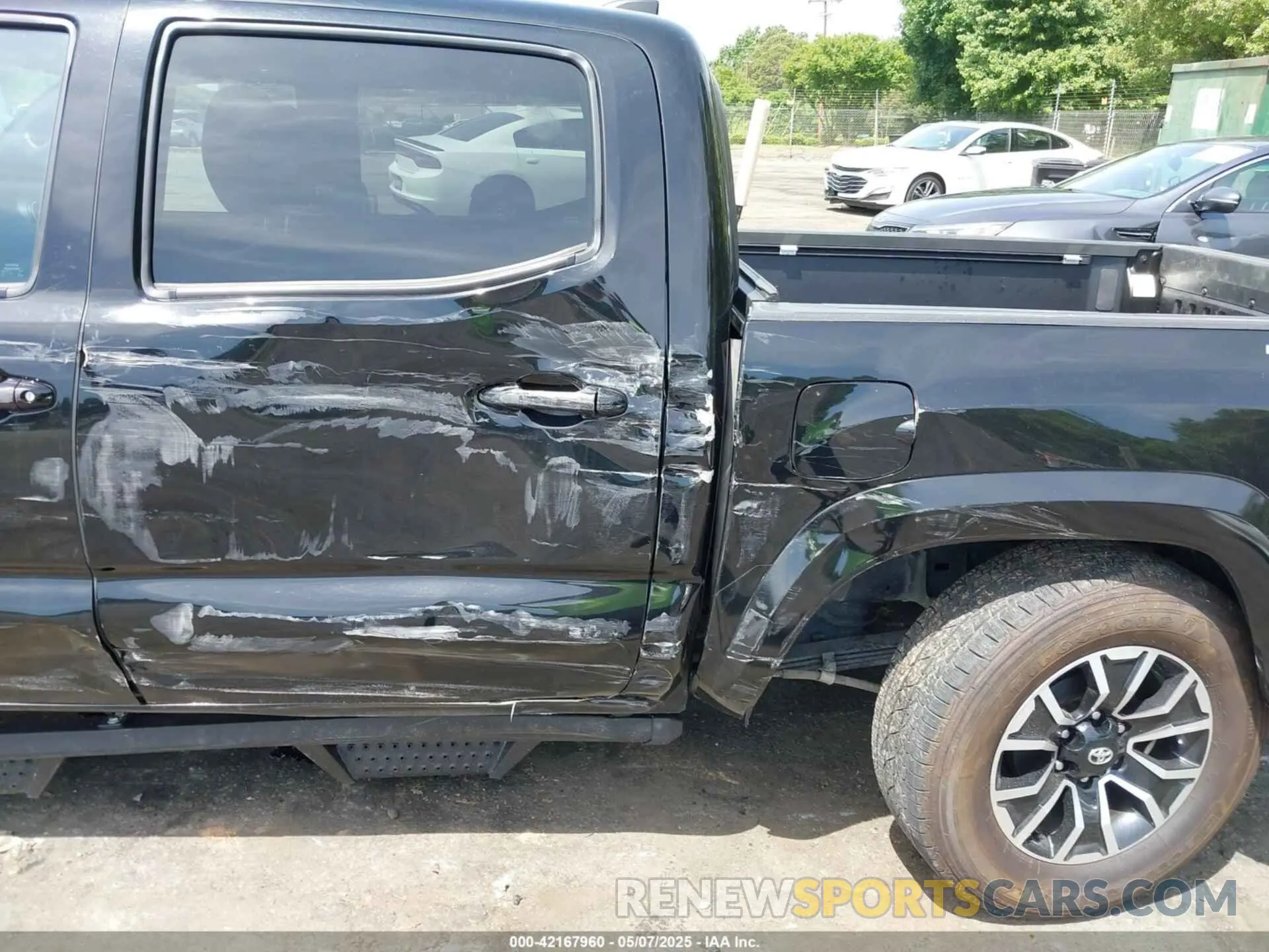 6 Photograph of a damaged car 3TMAZ5CN6PM197987 TOYOTA TACOMA 2023