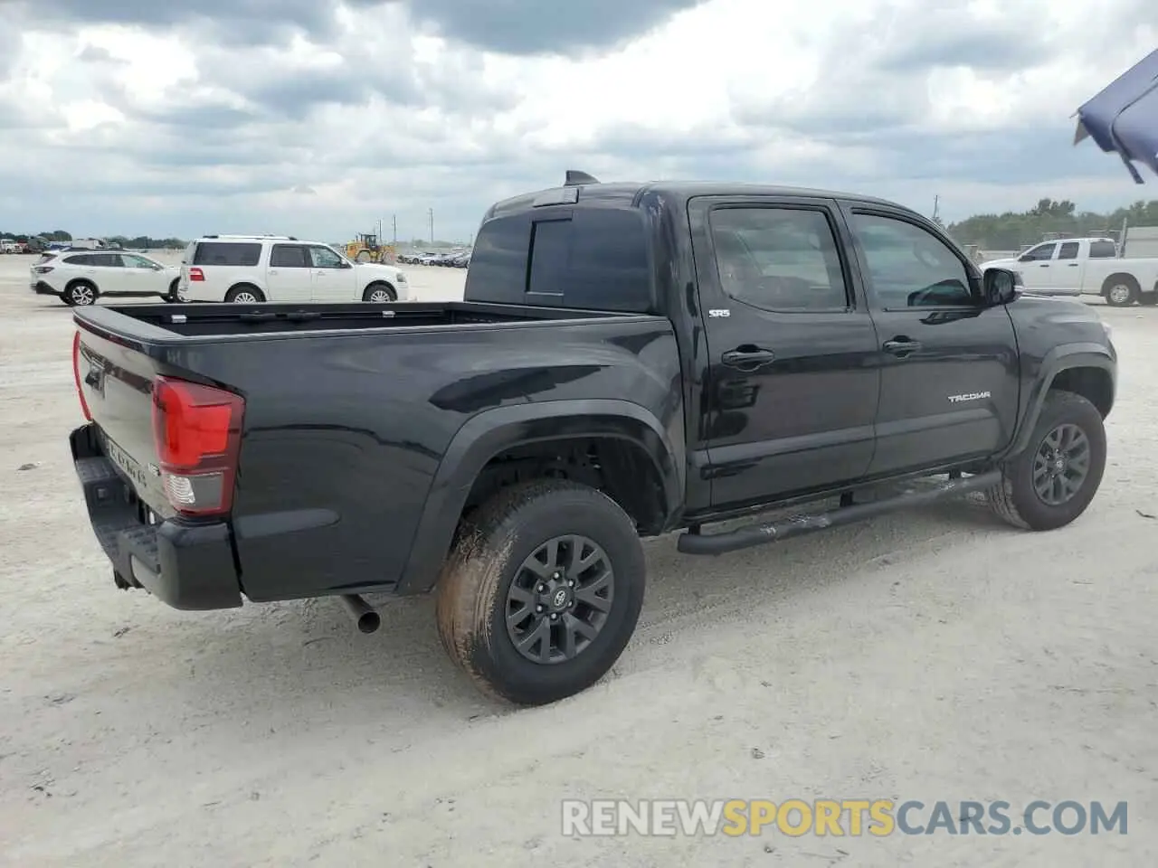 3 Photograph of a damaged car 3TMAZ5CN7PM213971 TOYOTA TACOMA 2023