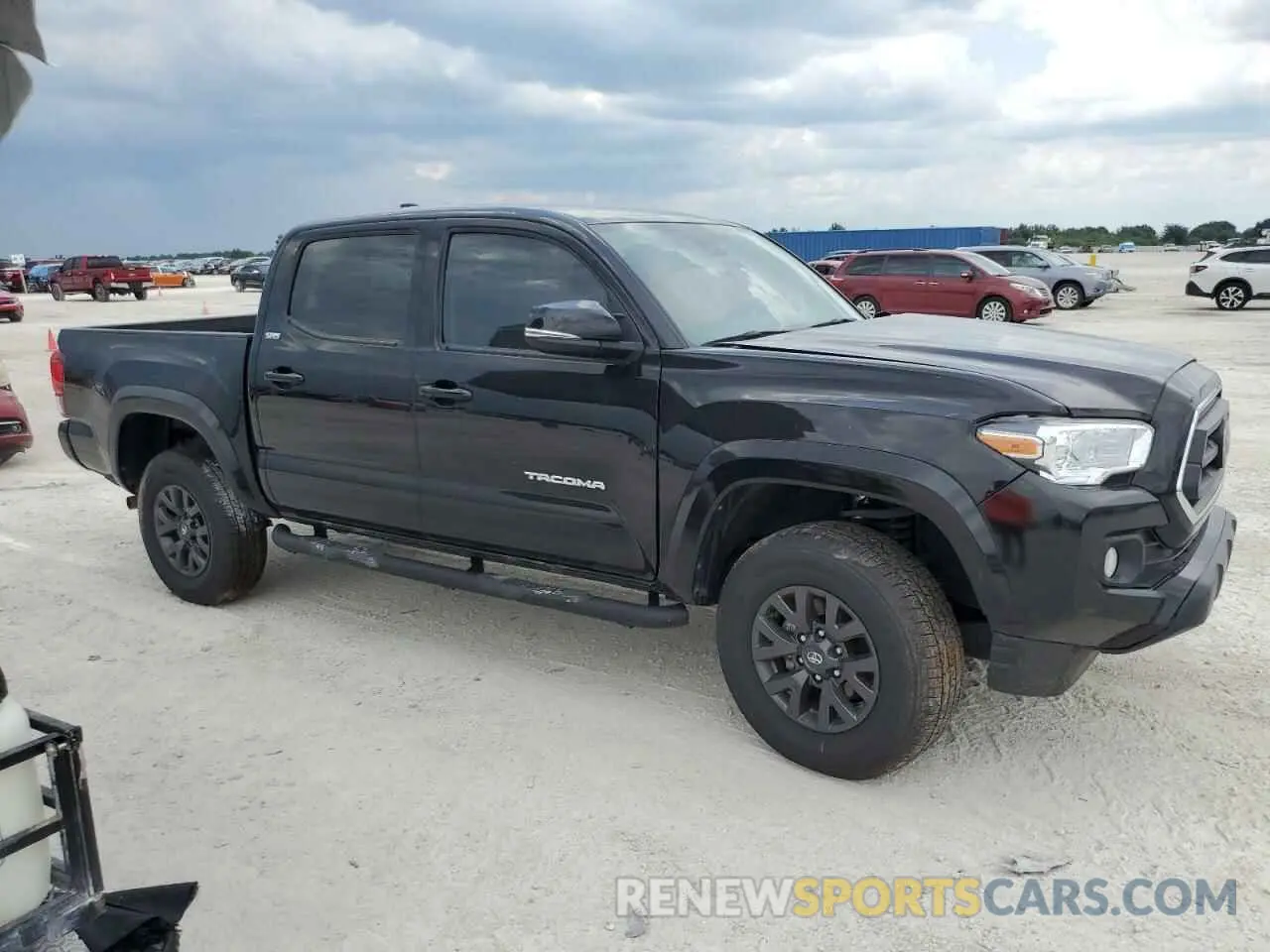 4 Photograph of a damaged car 3TMAZ5CN7PM213971 TOYOTA TACOMA 2023