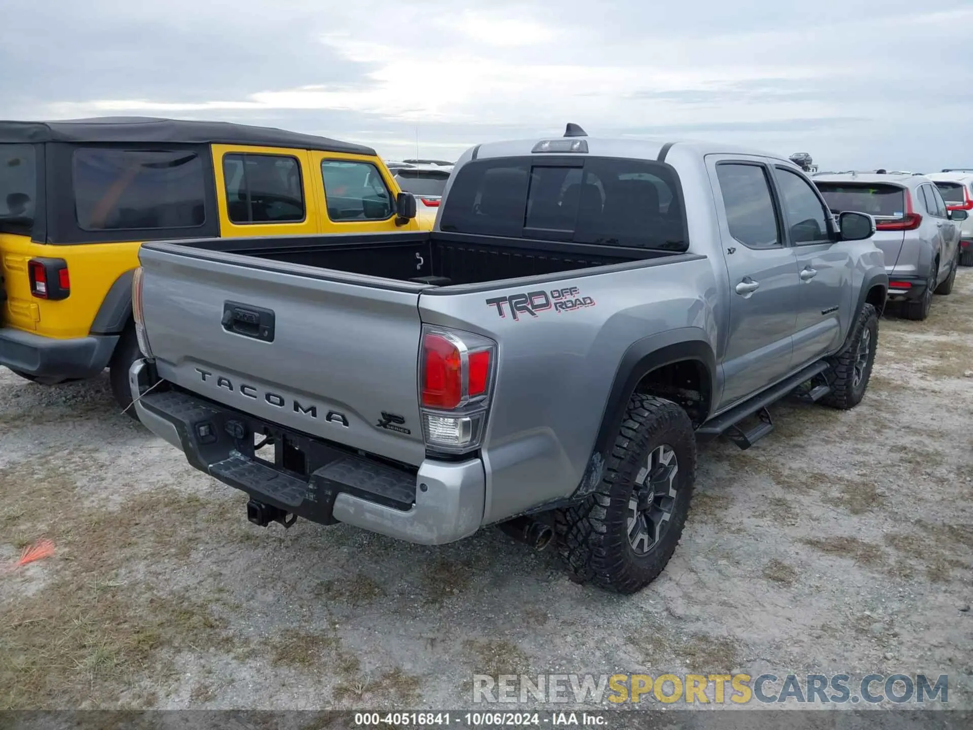 4 Photograph of a damaged car 3TMAZ5CN9PM212594 TOYOTA TACOMA 2023