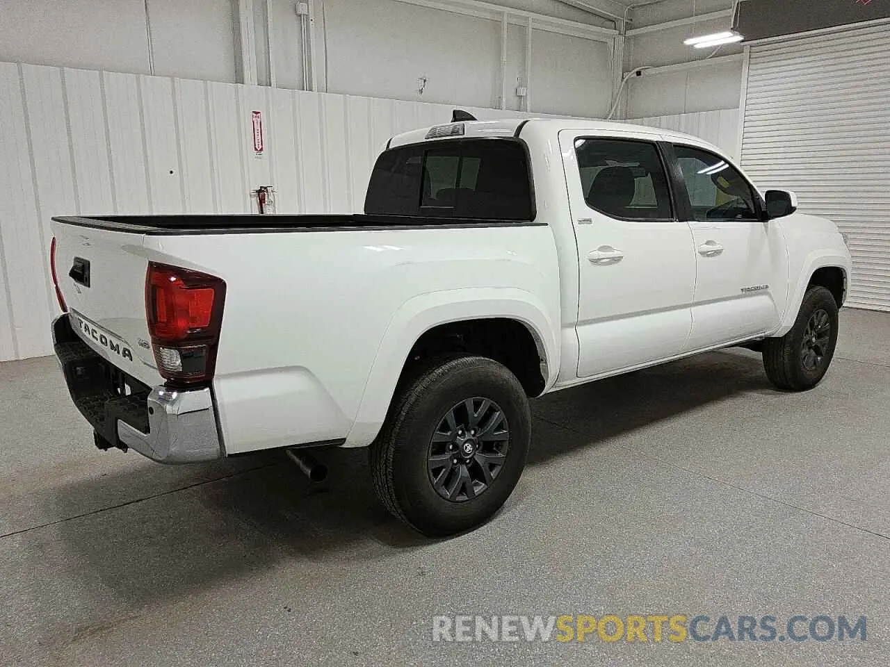 3 Photograph of a damaged car 3TMAZ5CNXPM201457 TOYOTA TACOMA 2023