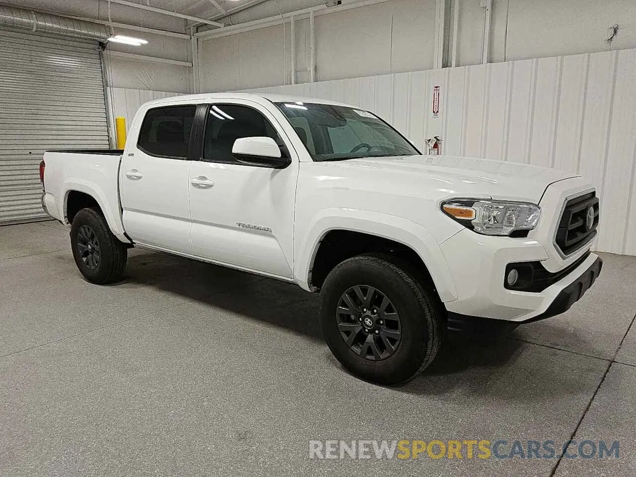 4 Photograph of a damaged car 3TMAZ5CNXPM201457 TOYOTA TACOMA 2023