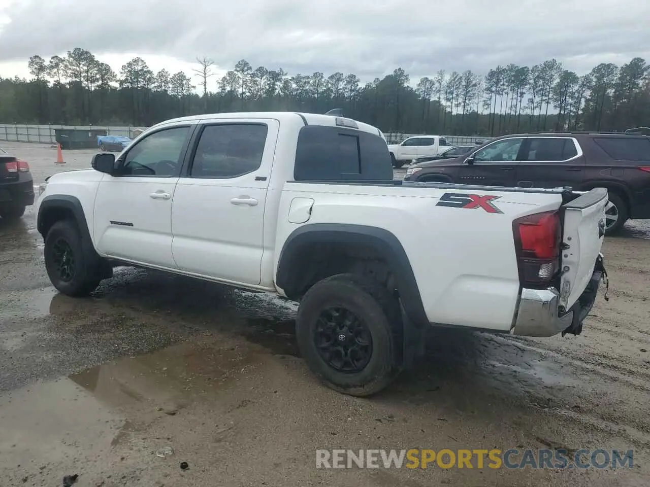 2 Photograph of a damaged car 3TMAZ5CNXPM212698 TOYOTA TACOMA 2023